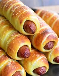 Weave the facon over the hot dog slice and add another pretzel bite half. Wrapped Up Hot Dog Recipes That Go Beyond Pigs In A Blanket Hot Dog Recipes Wrapped Hot Dogs Hot Dog Buns