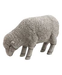 weather gray grazing sheep statue