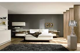 Camera da letto stile rustico moderno con la testata che si prolunga a 90°. Camera Da Letto Contemporanea