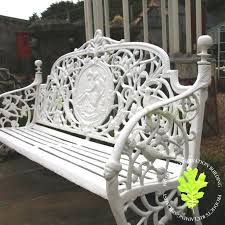 pair of cast iron benches