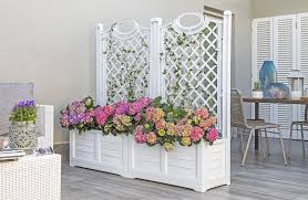 This white window box requires minor assembly and can be cut for a custom fit. Spruce Up Your Porch Or Patio With Trellis Planter
