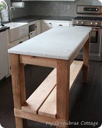 Ehemco kitchen island cart natural butcher block top in black base (repacked) $104.99. Reclaimed Wood Kitchen Island With Marble Top Knockoffdecor Com Wood Kitchen Island Reclaimed Wood Kitchen Island Diy Kitchen Island