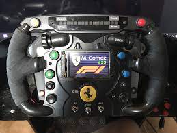 Detachable racing wheel featuring the thrustmaster quick release system. Thrustmaster F1 Add On Mod