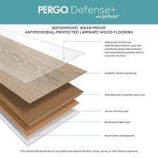 defense 7 48 in w cove mist oak waterproof laminate wood flooring 17 18 sq ft case