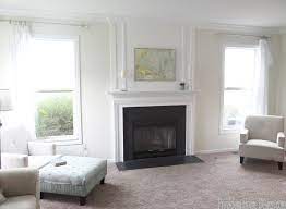 add wood trim above fireplace mantle