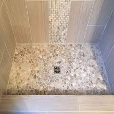 bathrooms showers pebble tile