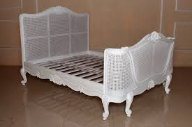 Bring in other elements that suit the aesthetic, such as hanging wall textiles and cozy throw pillows. French Chateau Rattan Bed White Rattan Bed Rattan Bed Frame Bed Sets For Sale