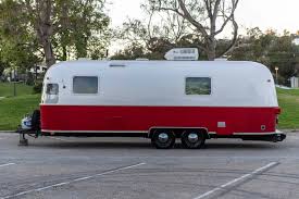 red 1975 airstream argosy 26