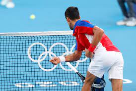 Novak Djokovic, throwing and smashing ...