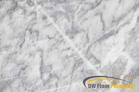 remove scratches from marble floors