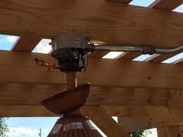 outdoor ceiling fan under our pergola