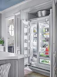 Gray Paneled Refrigerator And Freezer