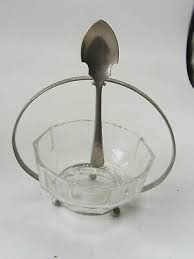 silver plated sugar bowl with spoon