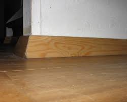 fill gap between baseboard and floor