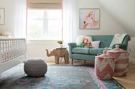 green vintage sofa with pink and blue
