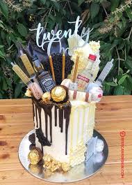 Half and half · white canned frosting and sprinkles for rimming the glass . 50 Vodka Cake Design Cake Idea February 2020 21st Birthday Cake Alcohol 21st Birthday Cakes Alcohol Birthday Cake