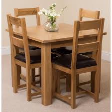 The kitchen table set includes a table and four chairs. Oslo Small Square Oak Dining Set With 4 Lincoln Oak Chairs Oak Furniture King