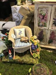 Wicker Chair In Miniature Flower Garden