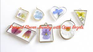 pressed flower jewelry with open bezels