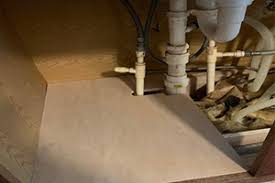 water damaged sink base cabinet floor