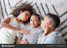 happy family lying carpet