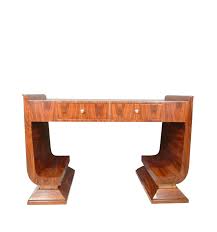 Our next featured desk has a look that can best be described as art deco meets the future. Art Deco Rosewood Desk Art Deco Furniture