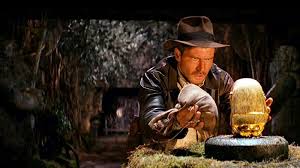 For a long moment it sits there, then the polished stone beneath the bag drops five inches. Indiana Jones And The Raiders Of The Lost Ark Fictionphile Podcast 1