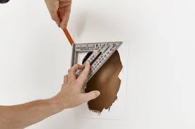 how to repair a large hole in drywall