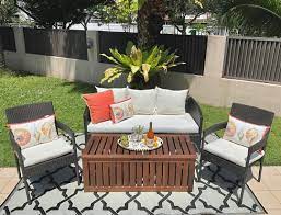outdoor sofa chairs and storage table