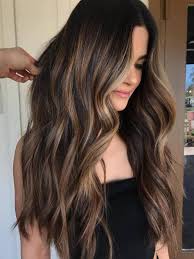 Standing somewhere between burgundy and eggplant tones, the fresh color hit splits into an impressive palette of dramatic and effortless shades. Long Light Brown Hair With Blonde Highlights Best Top Highlights With Blonde Hairstyles