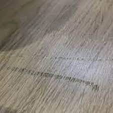 how to fix scratches on laminate floors