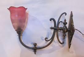 Pair Of English Converted Gas Wall Lights In Patinated Brass