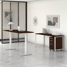 While this might be enough to satisfy some, power users that have a lot of paperwork, files or additional storage needs will want more space. Bush Business Furniture 400 Series 72w X 30d Height Adjustable Standing Desk With Credenza And Drawers