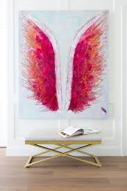 white wooden angel wings wall art