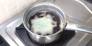 how to clean burnt milk from pan