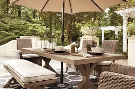 beachcroft dining table with umbrella