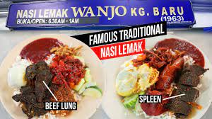 Malaysian nasi lemak is the definitely of heavenly food. Nasi Lemak Wanjo Kampung Baru Kuala Lumpur Traditional Flavours Youtube