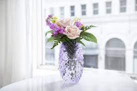 With our gridded vase trick, you can make your own if you start tall, you can always come down, not the reverse. How To Arrange Flowers In 9 Easy Steps Ftd Com