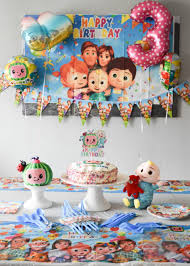The sheet cake is a birthday mainstay, but there's also the adorable cupcake cake to consider. Cocomelon Birthday Party Floradise