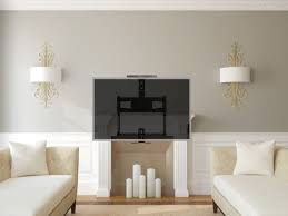 The wall has a space made specifically for the tv to sit comfortably above the fireplace. Pull Down Tv Over Fireplace Wall Mounted Tv Brackets Uk Tranquil Mount