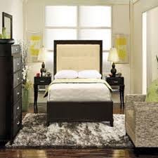 small bedroom with a queen bed
