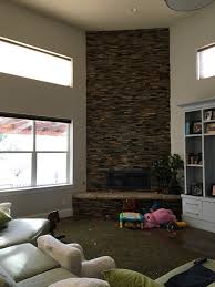 Floor to ceiling fireplace wall. Design Dilemma Floor To Ceiling Stone Fireplace
