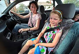 child to ride in the front seat 2024