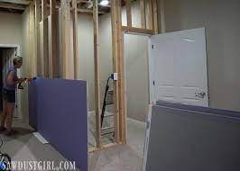 Flood Installing Purple Xp Drywall
