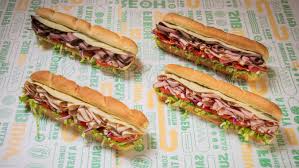 new deli subs piled high with more meat
