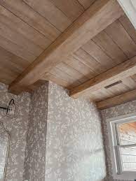 wood plank ceilings and faux beams