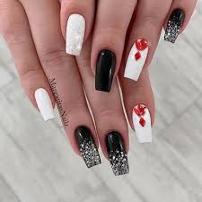 Red and white, mostly with a base of red and a cute design of presents on some fingernails to represent the gift of giving. 26 Simple White Nails Designs 2020 That Are Easy To Diy