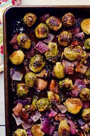 Thinly sliced brussels sprouts sauteed with bacon and onions, then tossed with roasted chestnuts, thyme and a little lemon juice. Roasted Brussels Sprouts With Bacon And Red Onion Make For An Easy Sure To Please Side Dish