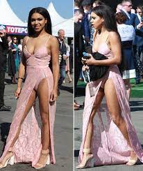 Grand National 2017 - girl in pink dress nearly suffers camel toe wardrobe  malfunction | Express.co.uk