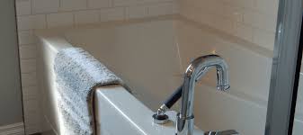 should you grout or caulk around tub